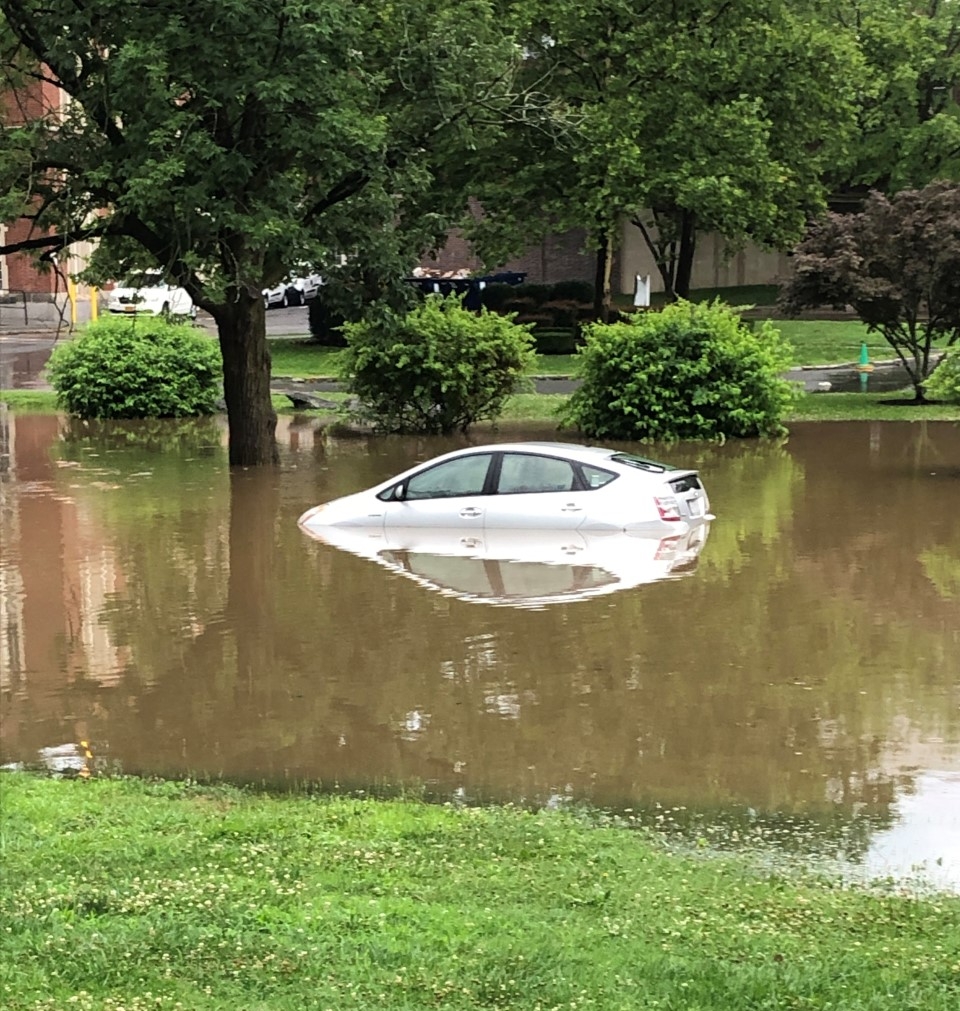 vehicle in flood heavy rain